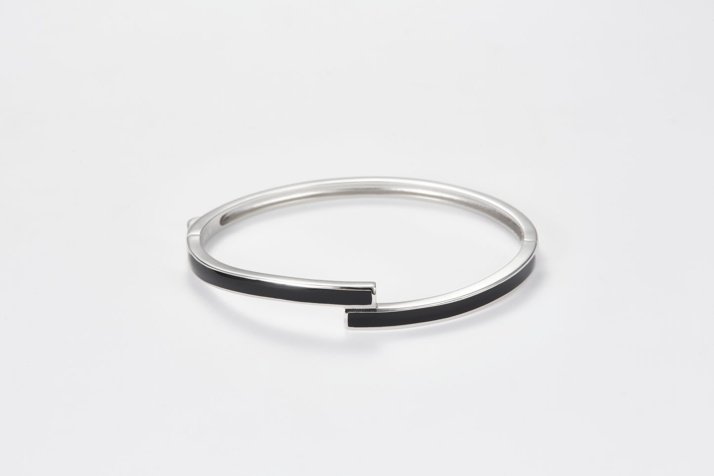 SMALTO Silver Twist Bangle - White Rhodium with Black Enamel