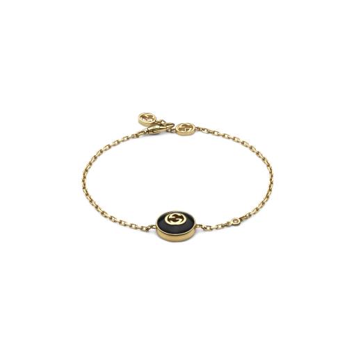 GUCCI INTERLOCKING Bracelet in yellow gold, onyx and 12mm Diamond pendant