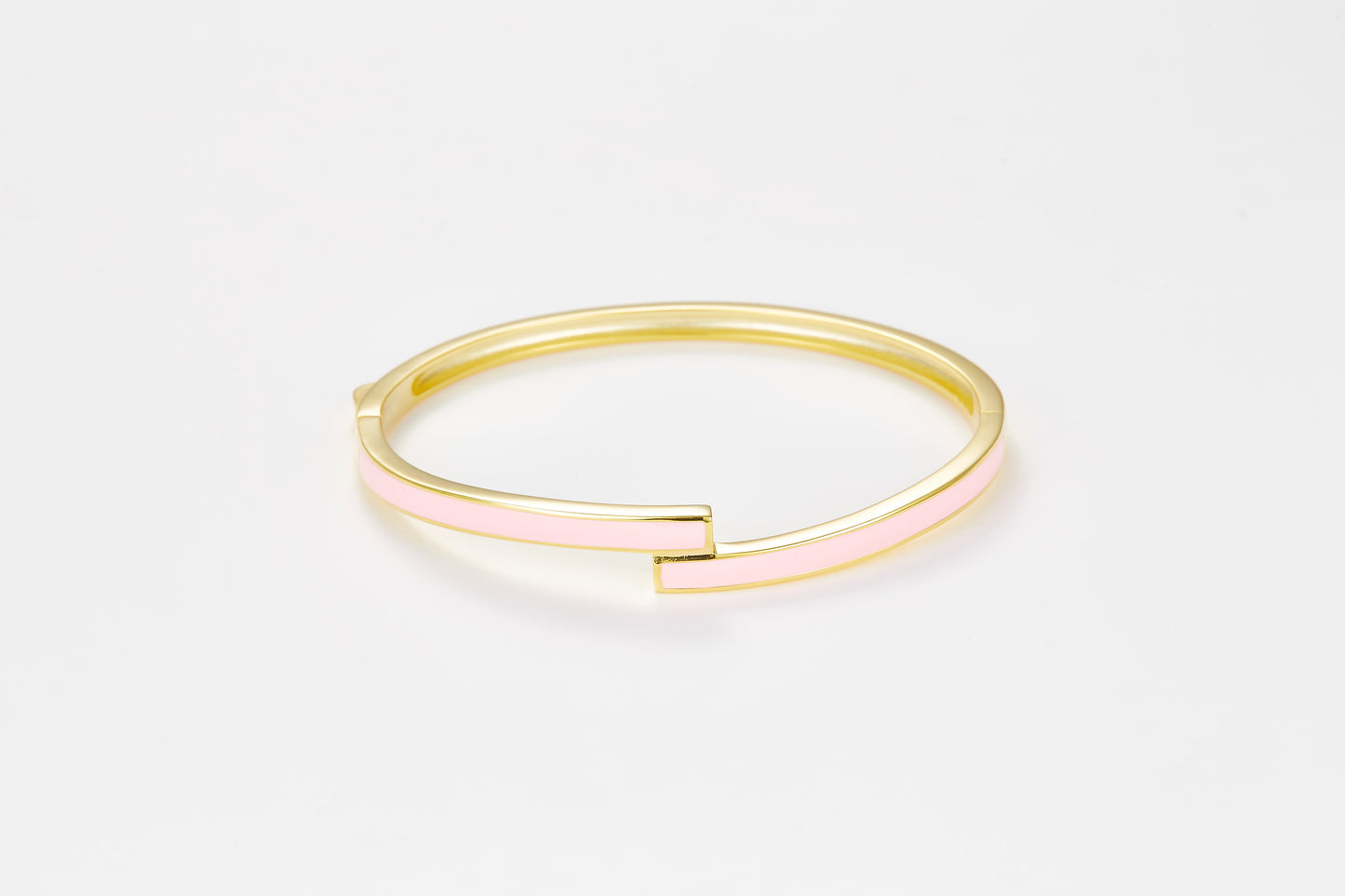SMALTO Silver Twist Bangle - Yellow Gold with Pink Enamel