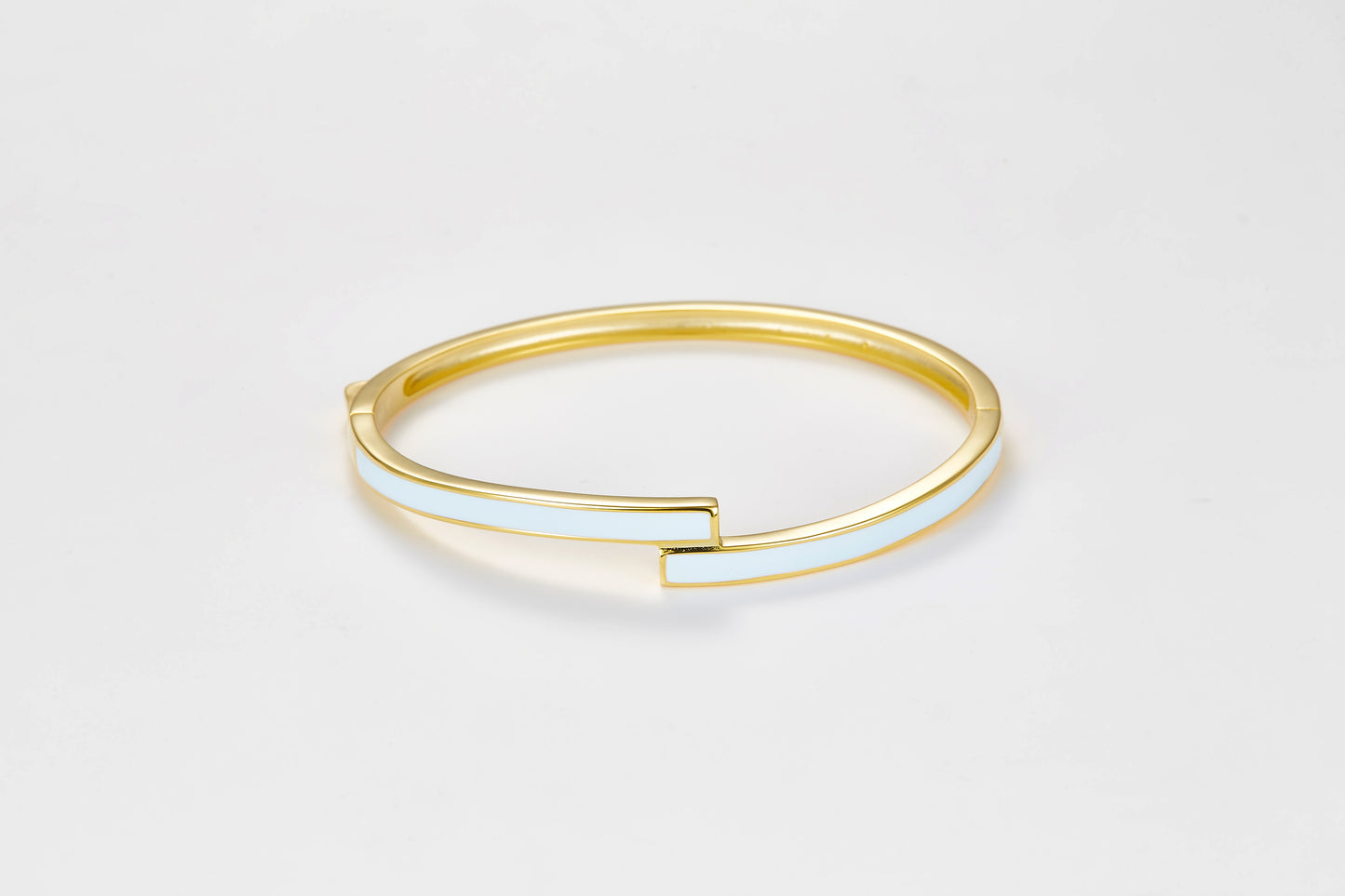 SMALTO Silver Twist Bangle - Yellow Gold Plated with Celeste Enamel