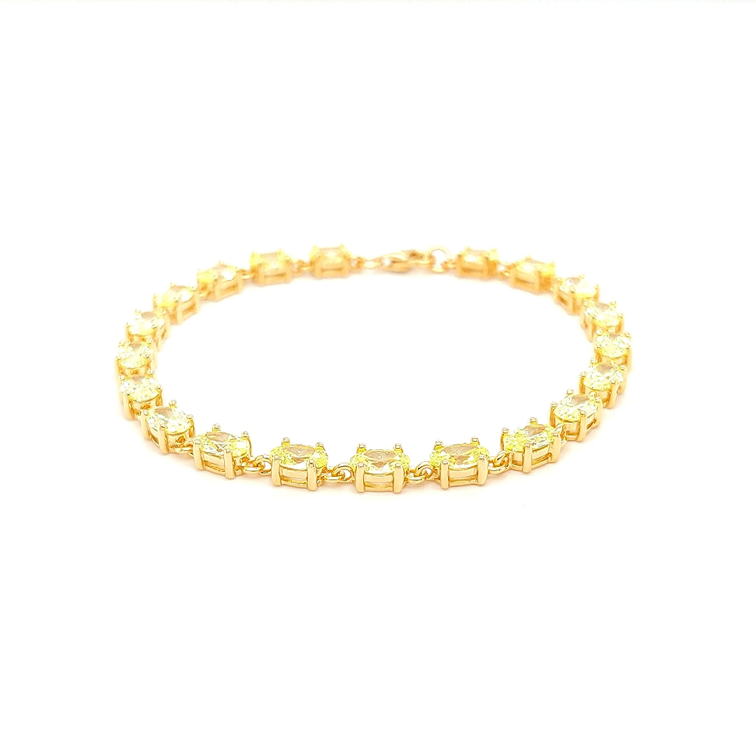 Sterling Jewellers' Ovale Verde Tennis Bracelet in Yellow Gold Plating with Apple Green Stones from the new Ovale Collection