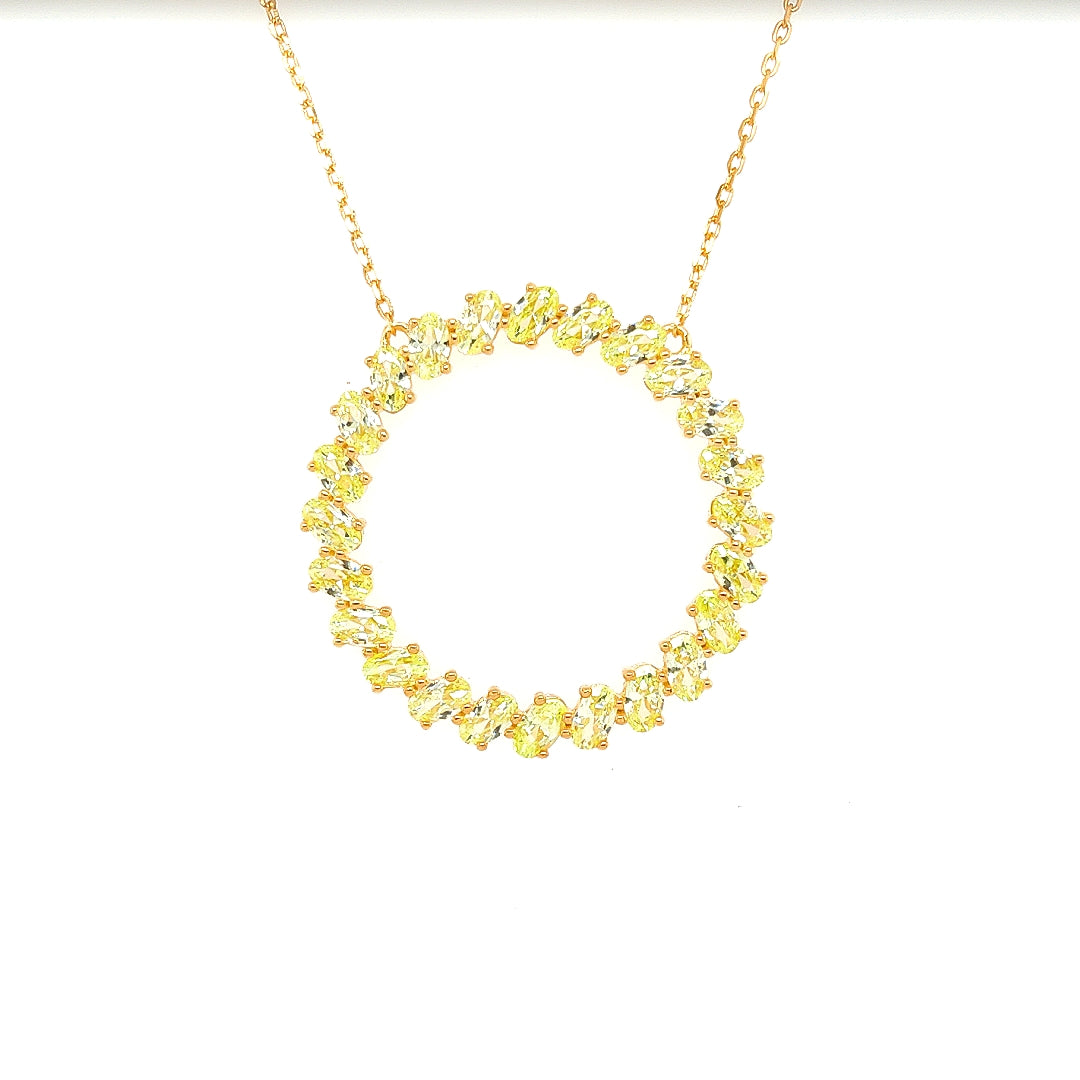 Sterling Jewellers' Ovale Verde Sole Sun Round Necklace in Yellow Gold Plating with Apple Green Stones from the new Ovale Collection
